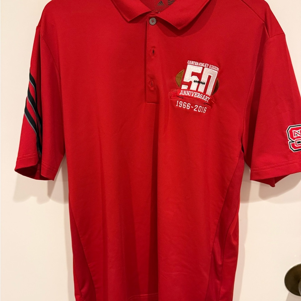 NCSU Adidas Red Polo Shirt with Carter-Findley 50 years Anniversary Logo